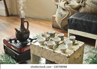 Brewing coffee in a traditional Jebena